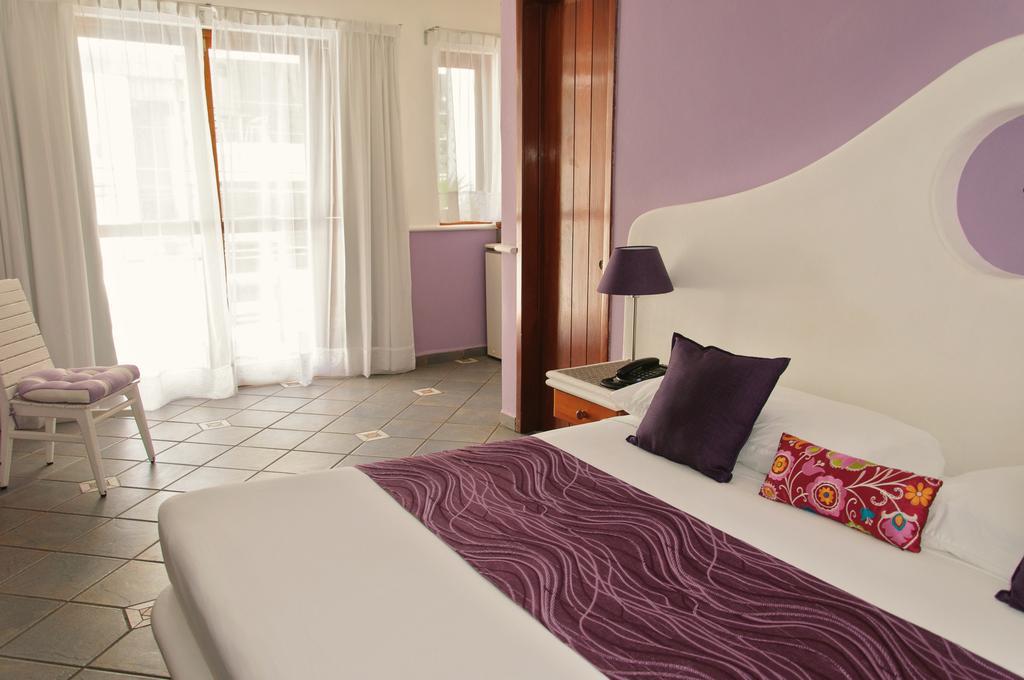Hotel Boutique Quinto Sol Playa del Carmen Oda fotoğraf